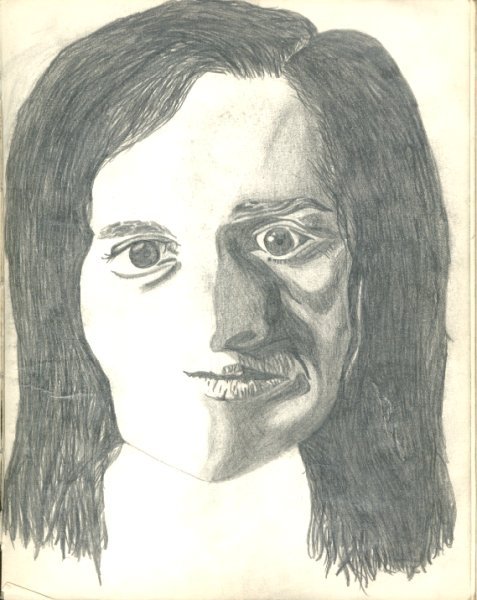 Drawing of a face with wild staring eyes.
